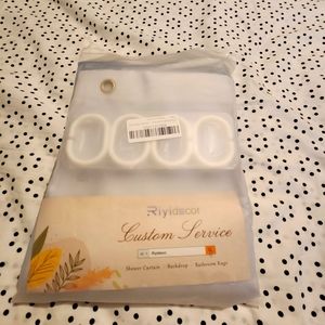 NWT/NIP.. Shower curtain with accessories.